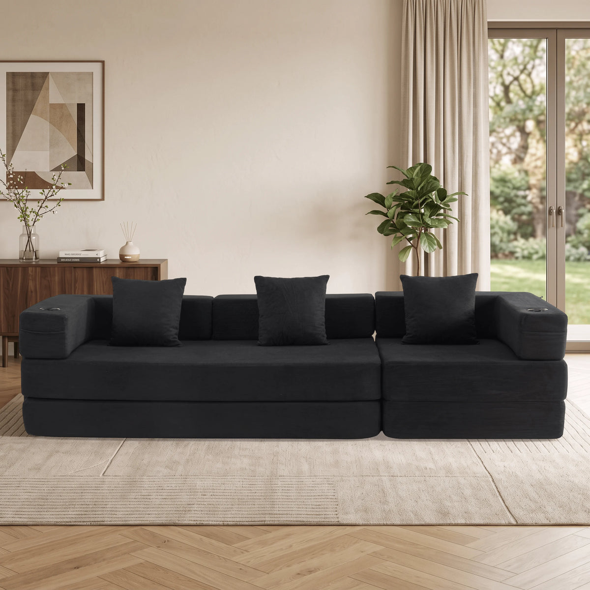 Canapé modulable 3 places noir, accoudoirs carrés et coussins sur le dossier