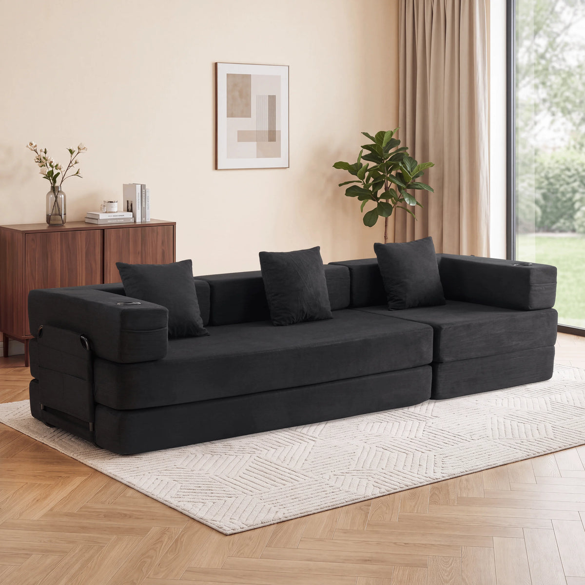 Canapé modulable 3 places en tissu foncé, coussins et accoudoirs, configuration droite