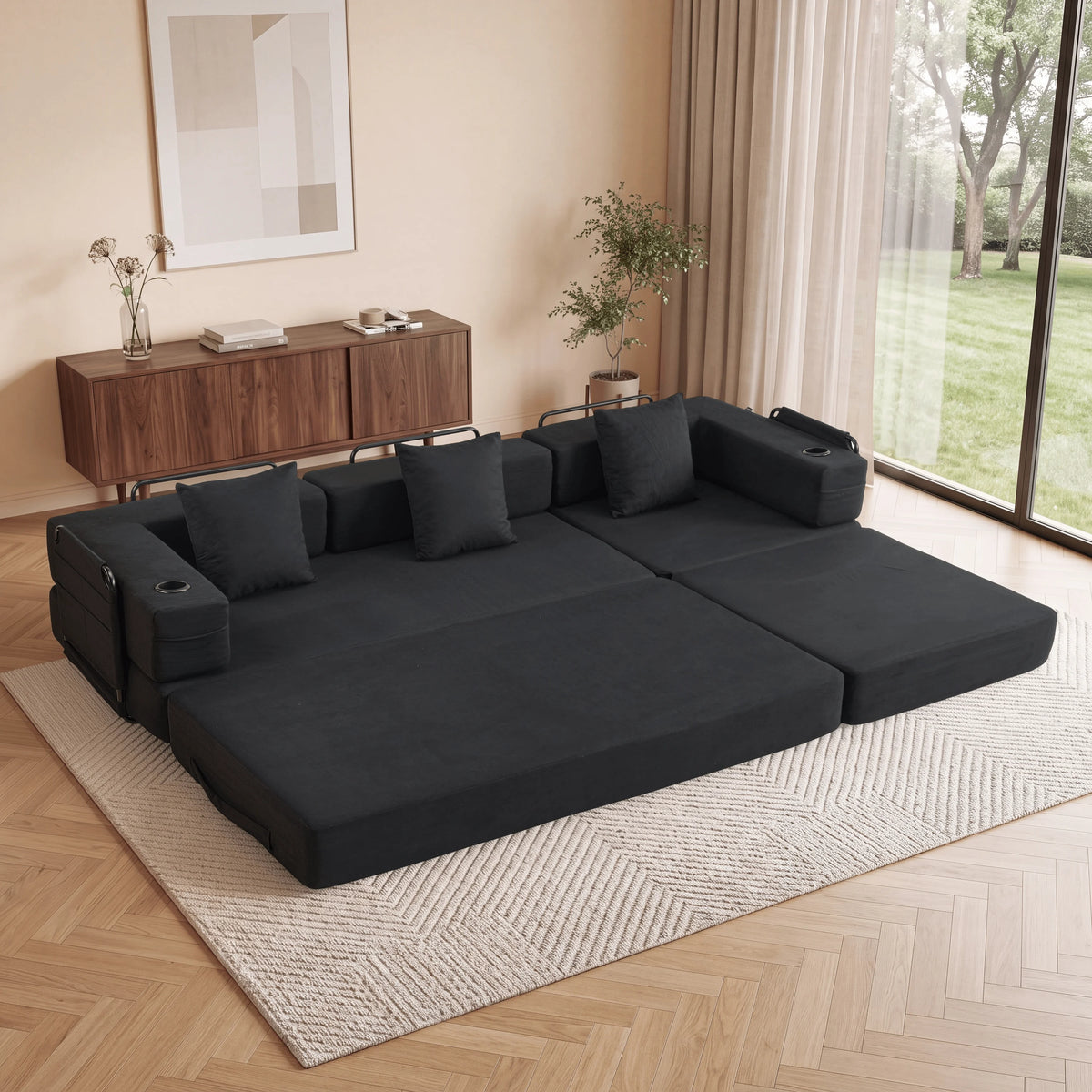 Canapé modulable 3 places noir, assise déployée avec coussins et accoudoirs intégrés
