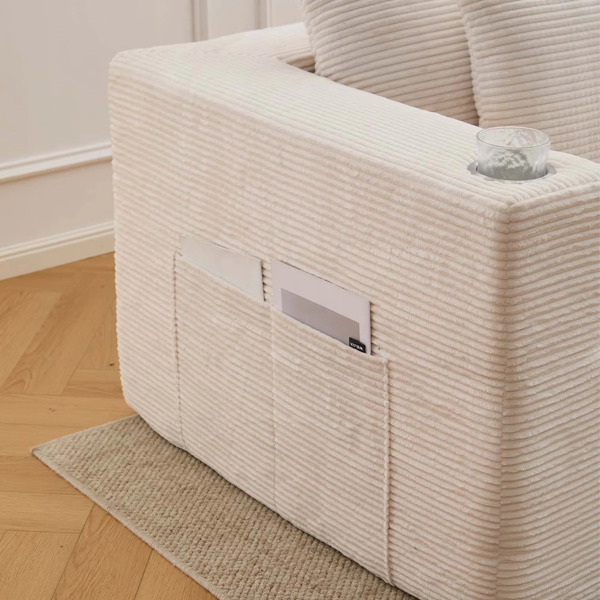 Canapé modulaire blanc cassé : compartiment de rangement à l’avant, tissu côtelé